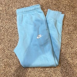 Light blue Nike joggers